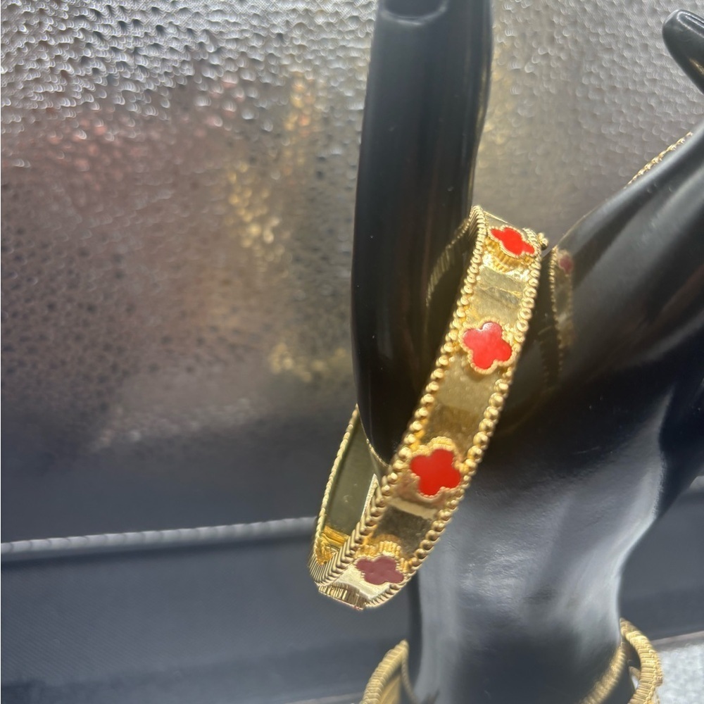Elegant Gold and Red Bangle